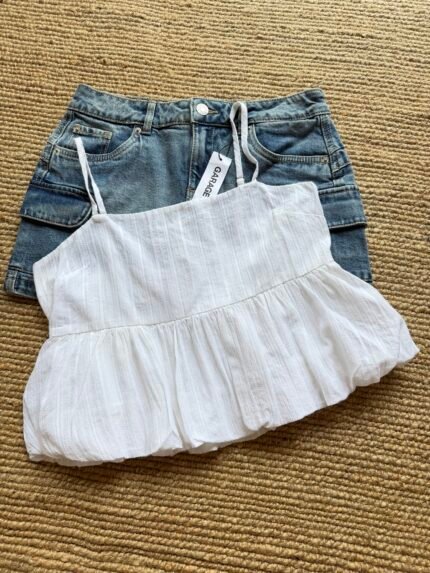 White sleeveless top