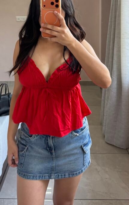 Red sleeveless top